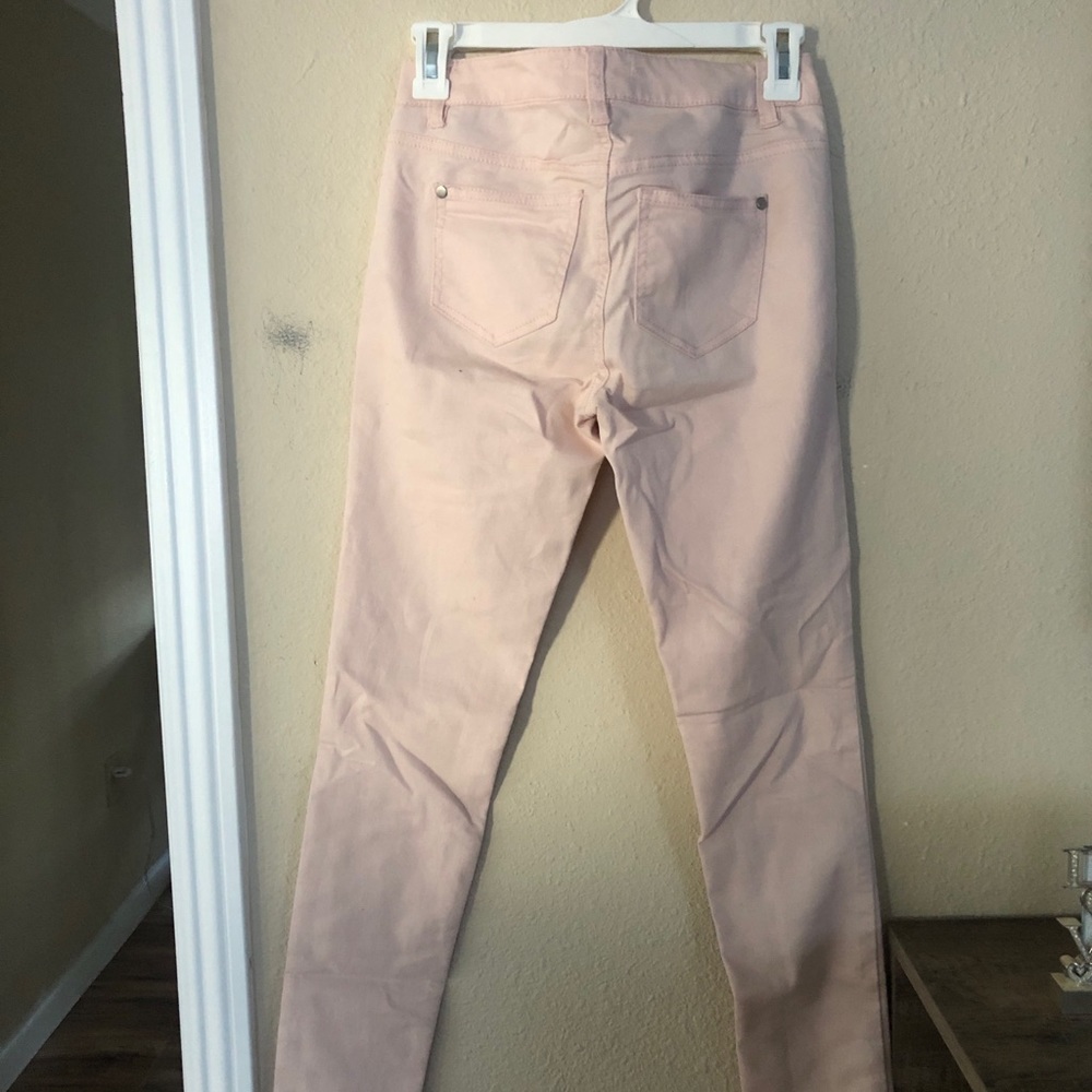 Rose colored jeans from the brand Fire Los Angeles